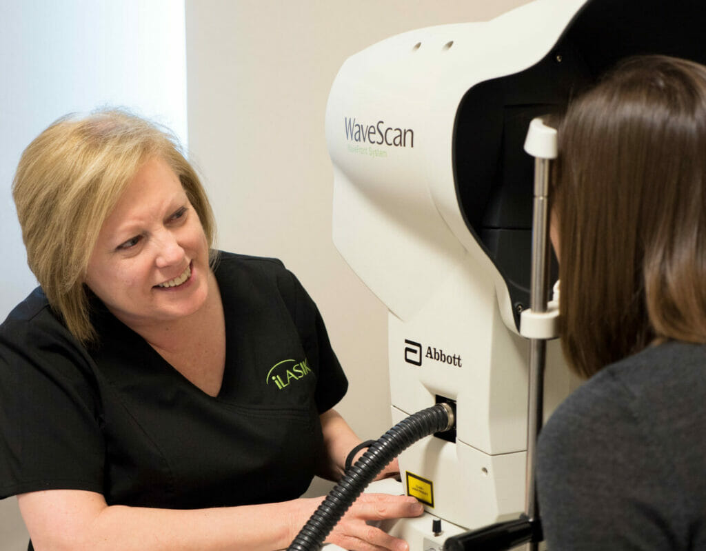 Woman being examined for LASIK surgery